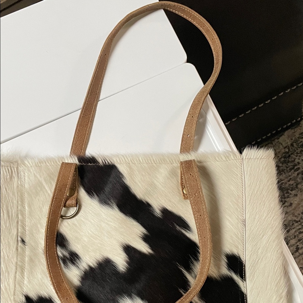 Black and White Cowhide Tote Bag with Tan Leather Handles - Picture 2 of 4